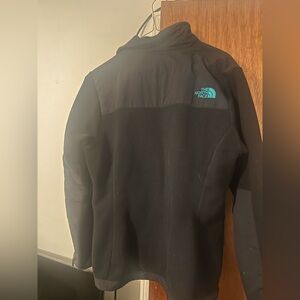 Black jacket with turquoise trimming